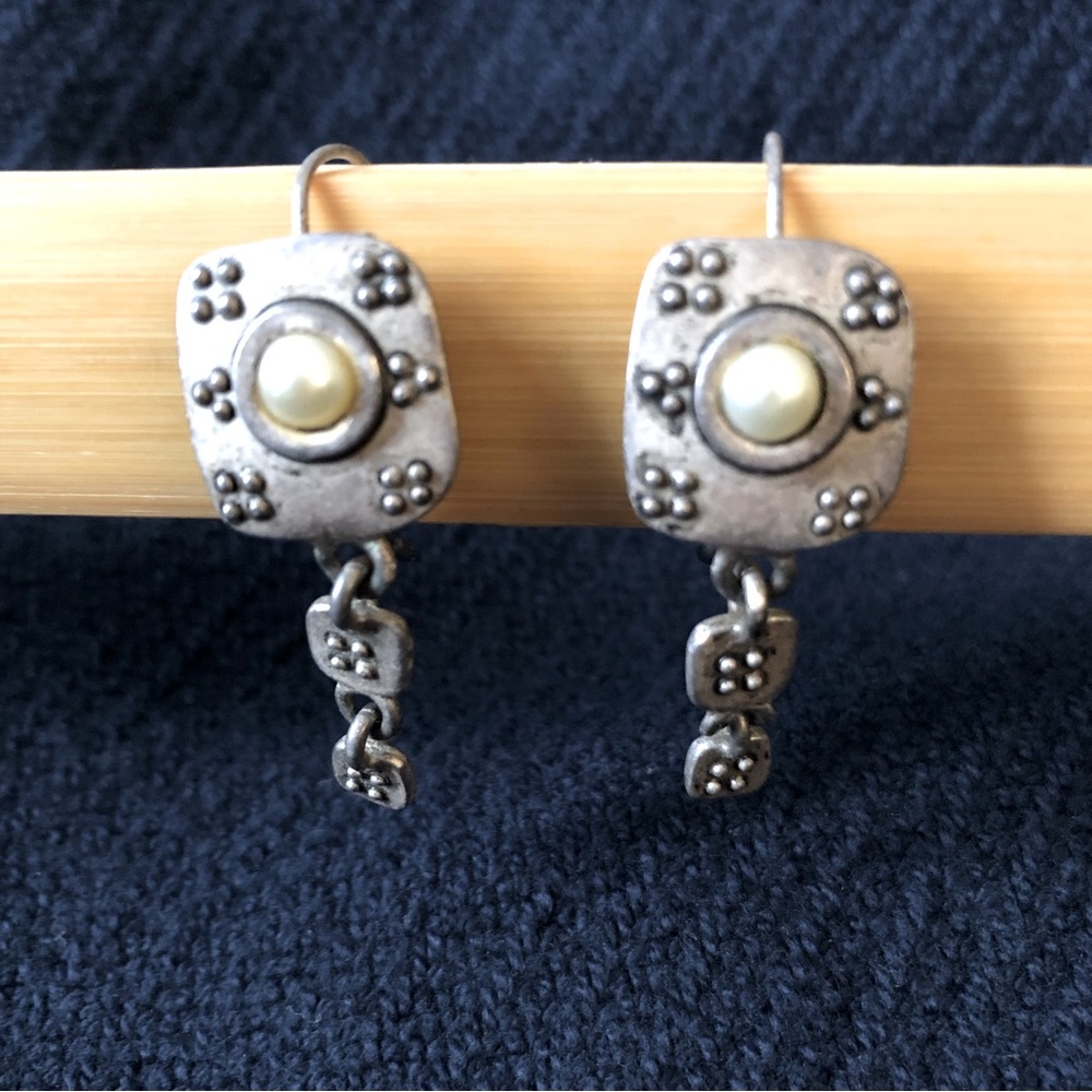 Antique style silver dangle earrings with faux center pearl.